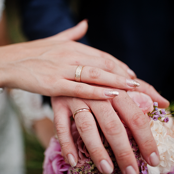 The Hands of a Couple on their wedding day